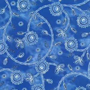 This cotton fabric features swirling vines intermingled with fun flowers in denim blue colors. 