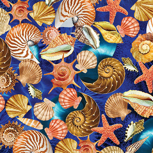 This cotton fabric featuring seashells such as starfish, conch, nautilus and scallop on a dark blue background