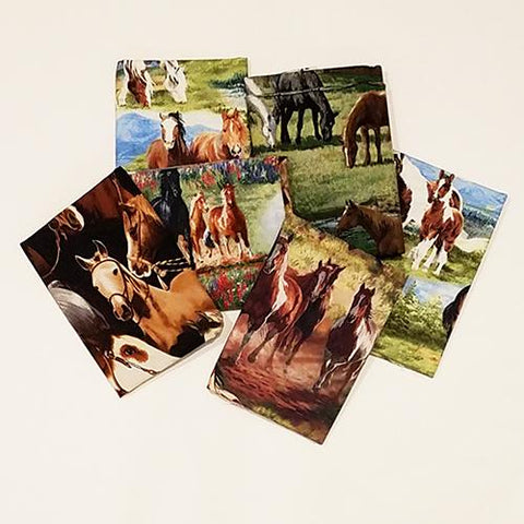 This bundle of fat quarters features a selection of horses both tame and wild and in their natural habitat grazing and galloping. 