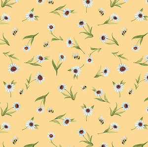 This cotton fabric features white daisies and little bumble bees on a yelow background.  Available at Colorado Creations Quilting