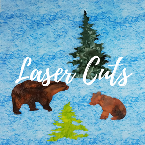Colorado Creations Quilting has laser cut fabric images such as bears and evergreen trees