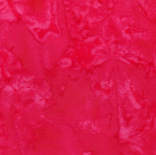 Mottled hot pink baitk cotton fabric.