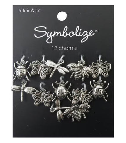 These charms are 1/2" square silver-colored selection of butterflies, bees and ladybugs