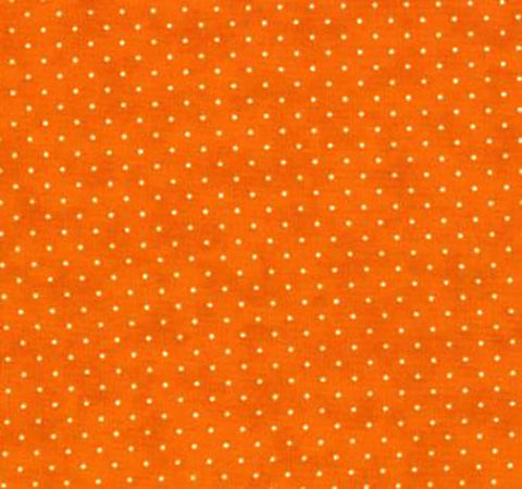 This cotton fabric features small white polkadots on orange. 