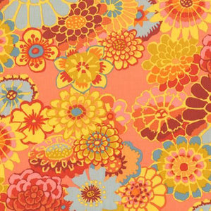 This cotton fabric by Kaffe Fasset features asian flowers in pastel shades of orange (coral), yellow and blue.