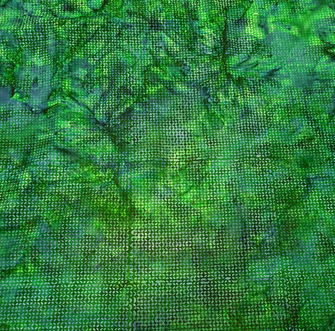 This batik cotton fabric features small x's in shades of a blue-green.  Available at Colorado Creations Quilting