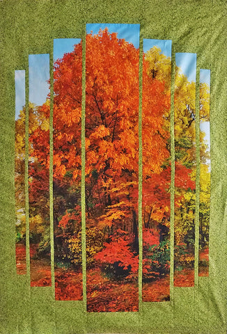 Quilt center features autumn tress of rich oranges and golds with pin-striped green borders