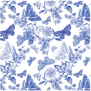 This fabric features blue butterflies and flowers on a white background. Available at Colorado Creations Quilting