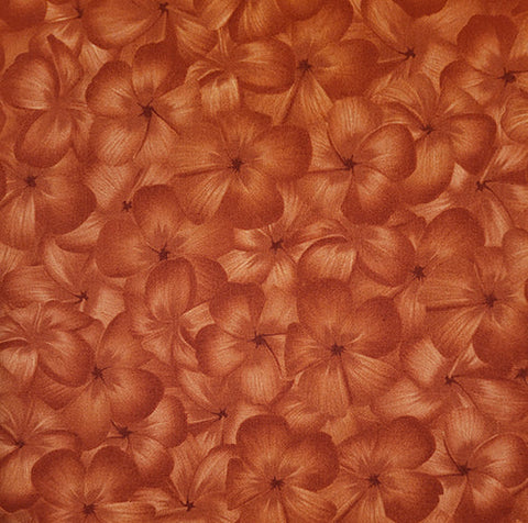 This fabric featuresflowers in shades  tonal packed flower heads in shades of rust.