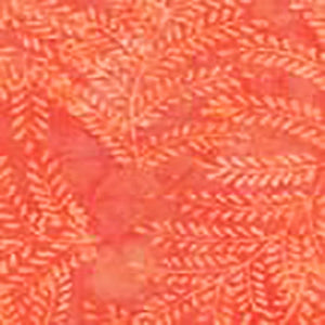 This vibrant orange batik features fern branches