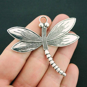 Silver dragonfly wing charms 1" long by 1/4" wide