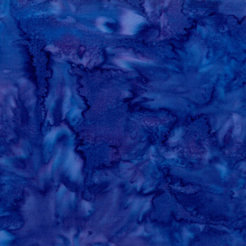 This batik cotton fabric is deep blue with some purple. 