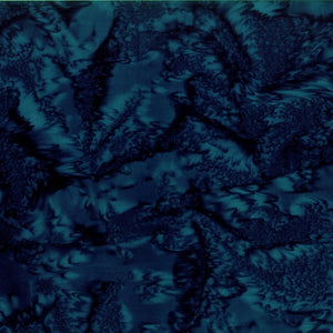 This batik cotton fabric features a dark navy blue color.