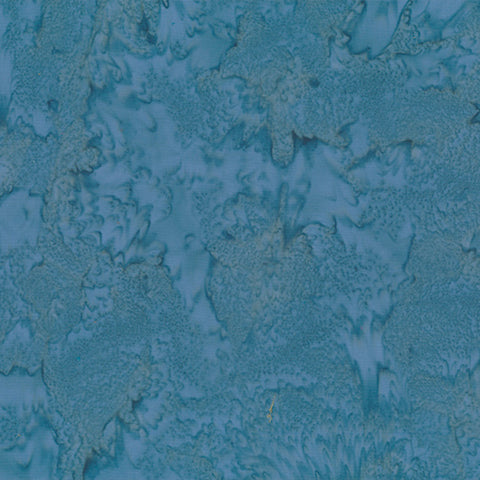 Close-up of textured bluish-gray surface batik cotton fabric