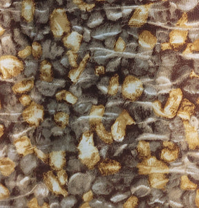 River rocks in shades of gray and brown cotton fabric available at Colorado Creations Quilting