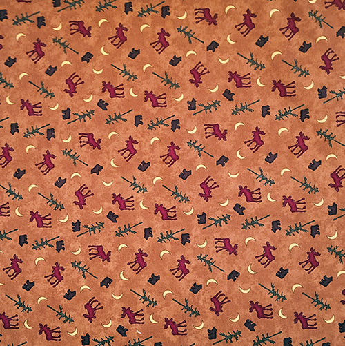 This cotton fabric features moose, bears and evergreen trees on a brown background.