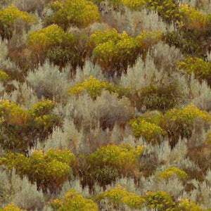 This cotton fabric features wild grasslands complete with flowering bushes.