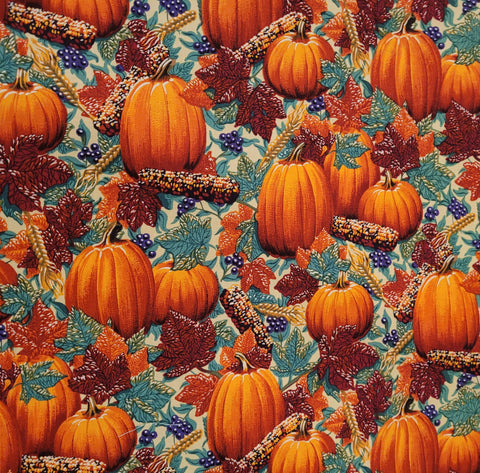This cotton fabric features pumkins, fall corn, leaves, berries and more. 