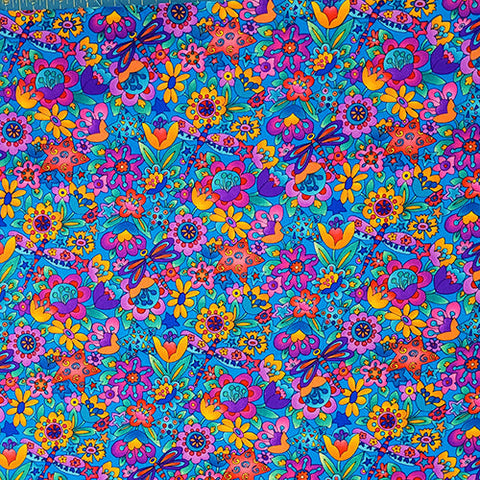 This cotton fabric features brightly colored flowers and dragonflies on a blue background.