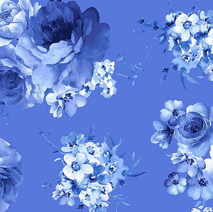 This cotton fabric features large blue flower clusters on medium blue background. 