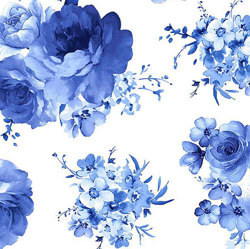 This cotton fabric features large blue flower clusters on white background. 