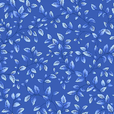 This cotton fabric features small blue leaves tossed on a blue background.