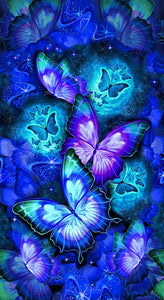 This fabric panel features glowing butterflies in blue, purple and turquoise on a black background. 