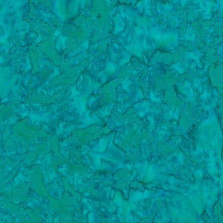 This fabric features a mottled turquoise batik. 