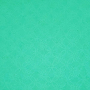 The tonga batik fabric features a tonal green in the style of mellons or the wedding ring. Available at Colorado Creations Quilting