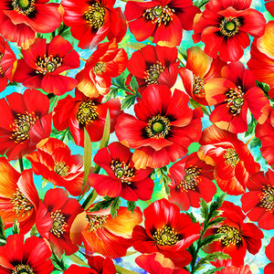 Brightly-colored red poppies on blue background are featured on this cotton fabric