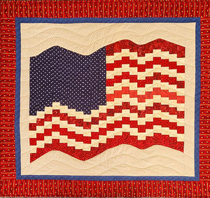 Display your patriotism in a unique way with this flag wall hanging using the bargello technique. 