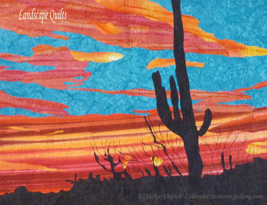 Saguaro Sunset quilt pattern by Jackie Vujcich of Colorado Creations Quilting  features a silhouette of the cactus with a blue and orange sunset in the background.  