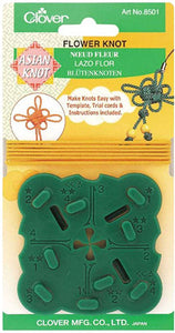 A plastic template to help you make Asian flower knots out of cording.