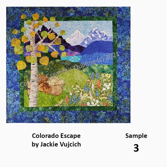 The serenity of a calm mountain lake below majestic purple mountains with wildflowers and an aspen tree invites you to escape for a while. This wall hanging designed, created and quilted by Jackie Vujcich of Colorado Creations Quilting will surely put a smile on your face each time you view it