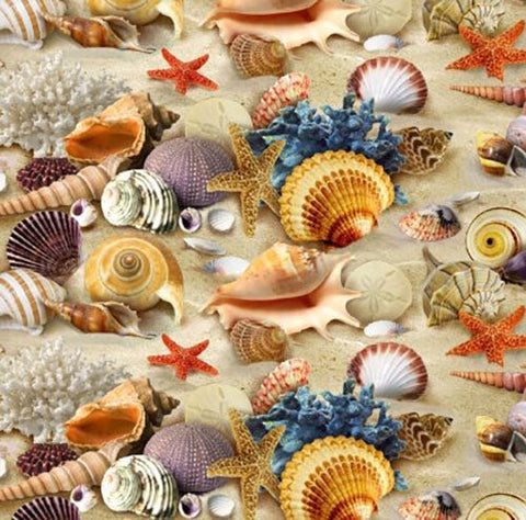 This cotton fabric features brilliantly colored seashells on sand