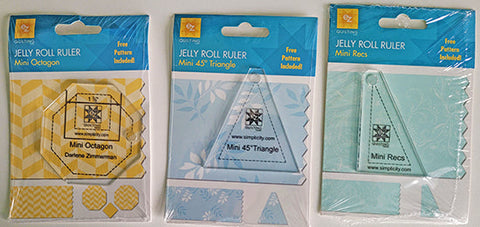 Quilting acrylic templates to make trinagles or diamonds from 2 1/2" jelly roll strips.