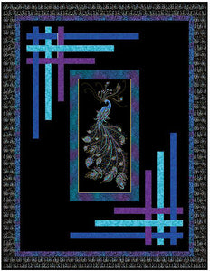 This quilt features a fabric panel with a peacock on a black background along with blue, turquoise and purple fabrics.