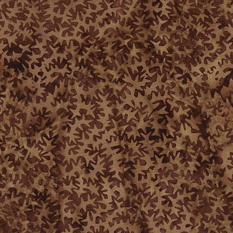This brown tonal fabric features geometric spike shapes by Island Batiks. Available at Colorado Creations Quilting