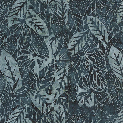 This batik tonal fabric features leaves on an blue-gray background. 