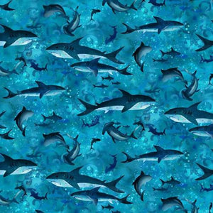 Blue tonal cotton fabric featuring sharks available at Colorado Creations quilting