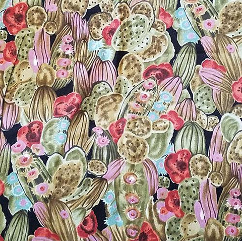 These large packed cacti feature large blooming flowers cotton fabric. Available at Colorado Creations Quilting