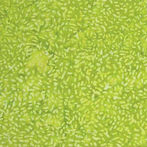 This cotton batik fabric looks like lime green rice and is available at Colorado Creations Quilting