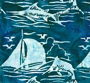 This cotton batik fabric features sailboats and marlin in rich blue. Available at Colorado Creations Quilting
