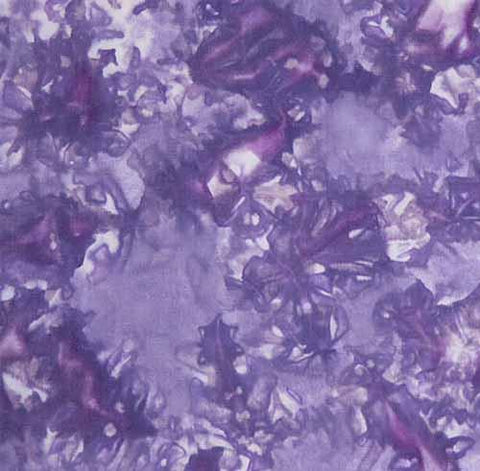 This cotton batik fabric looks like purple broken glass and is available at Colorado Creations Quilting