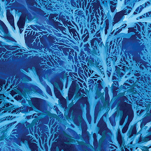 This cotton fabric featuring coral in shades of blues on a rich blue background