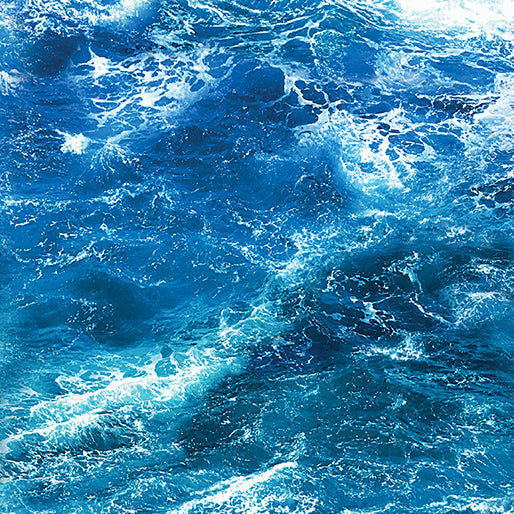 This cotton fabric features blue ocean waves