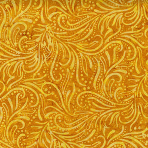 This Bali batik featuring rich golden swirls and curves Batik Cotton Fabric