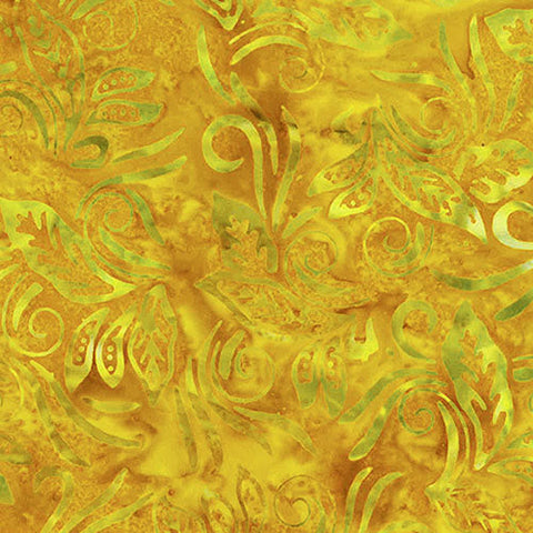 This Bali batik fabric features banana leaves on a gold background Cotton Fabric