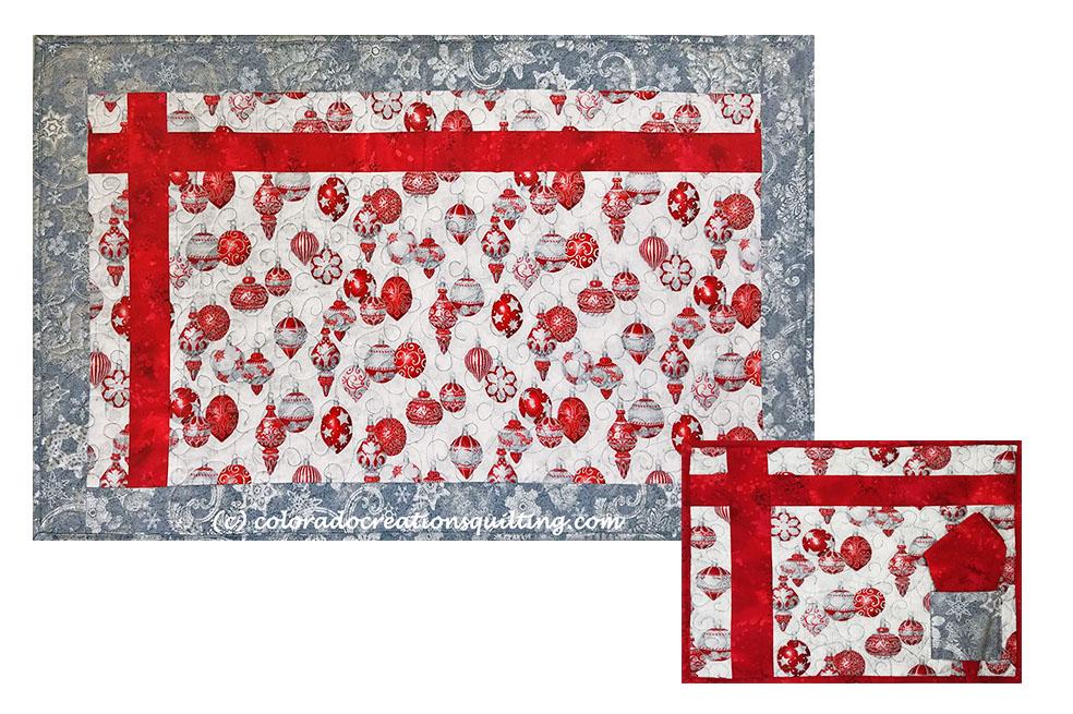 Table runner and placemat; silver ornamentson white with red accent and sliver borders.  Placemat has red napkin.