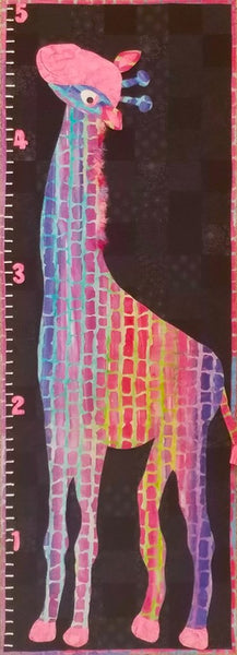 This adorable five-foot brightly spotted giraffe in pinks, blues and yellows on a background of black in the form of a grow chart is the subject of this quilt pattern, Stand Tall, by Jackie Vujcich of Colorado Creations Quilting.